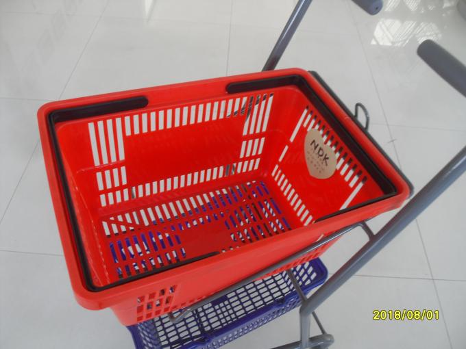 Carrello rosso/blu di acquisto del supermercato con 4 macchine per colata continua a 3 pollici del PVC della parte girevole